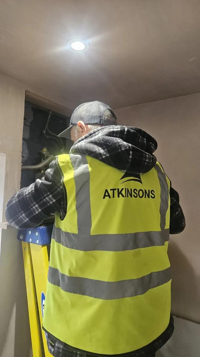ATKINSONS Gas Safe engineer installing a boiler in Sunderland