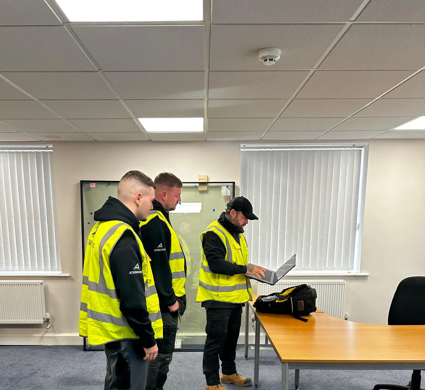 ATKINSONS electricians reviewing EICR test results in Durham